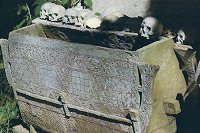 Old coffin with skulls